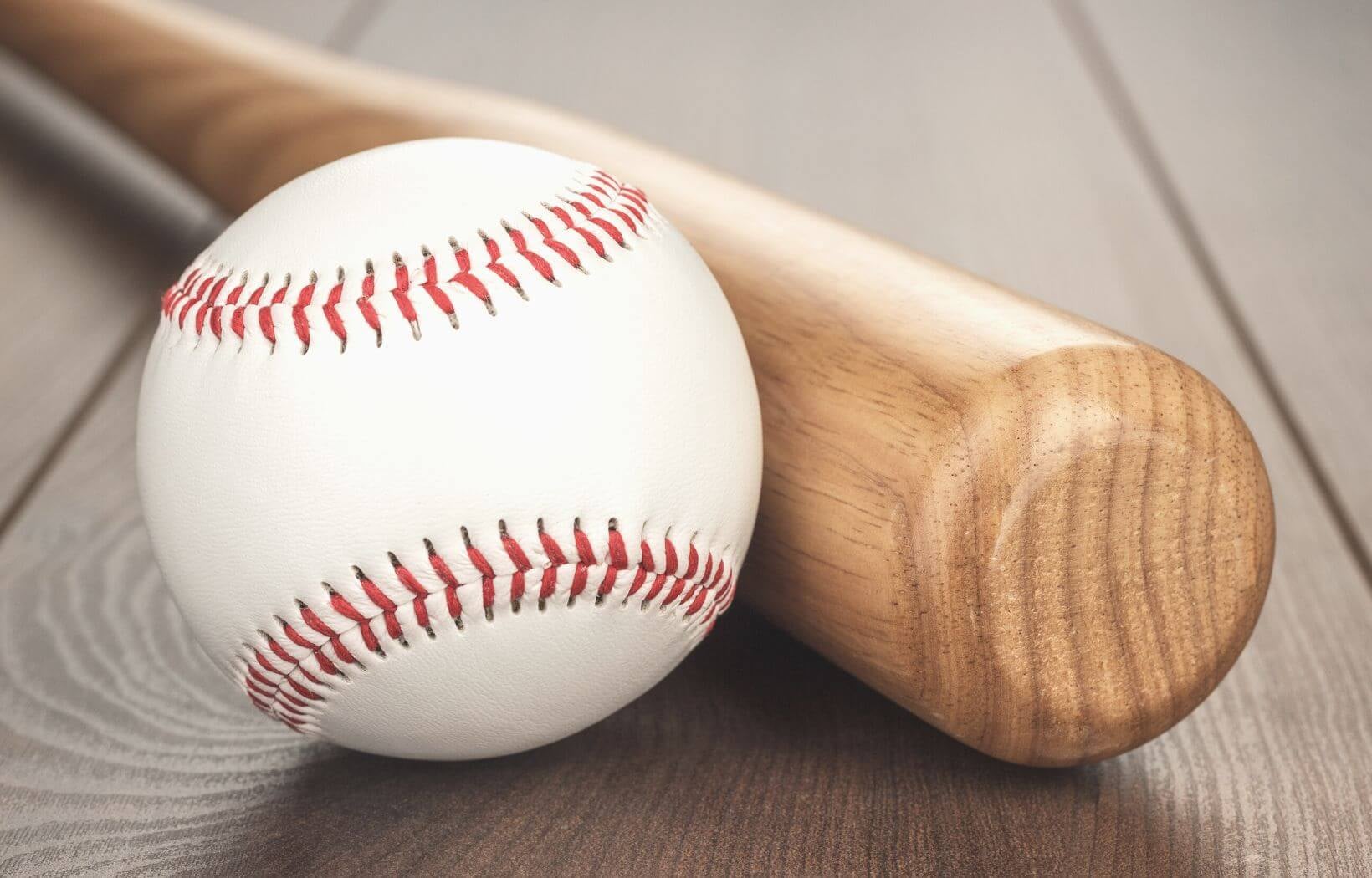 Close up of basetball and bat